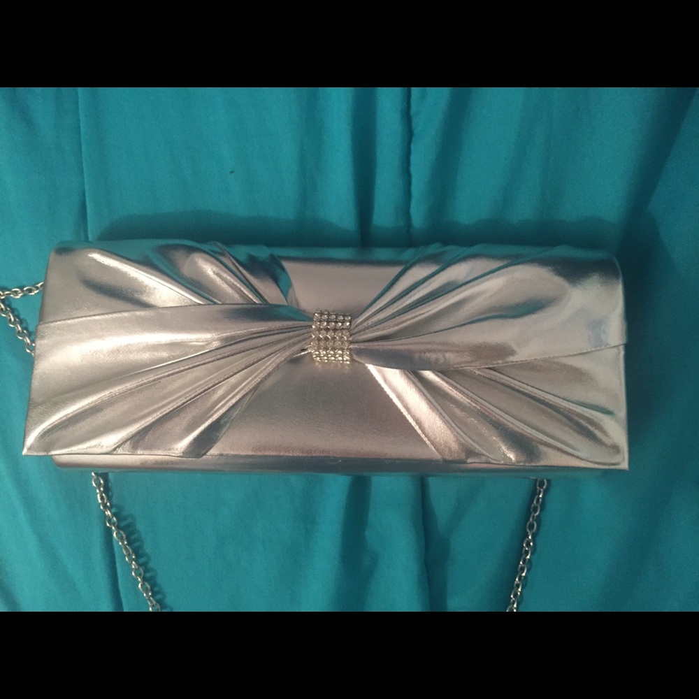 Silver twist clutch